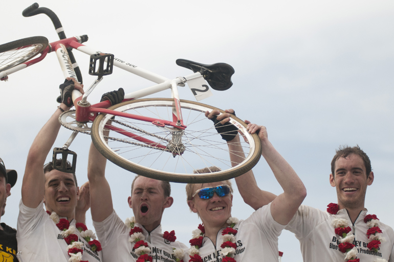 Black Key Bulls riders Jimmy Rosati, Spencer Brauchla, Jacob Miller and Steven Gomez celebrate their team\'s first victory in the men\'s Little 500 at Bill Armstrong Stadium in Bloomington, Saturday, April 26, 2014.