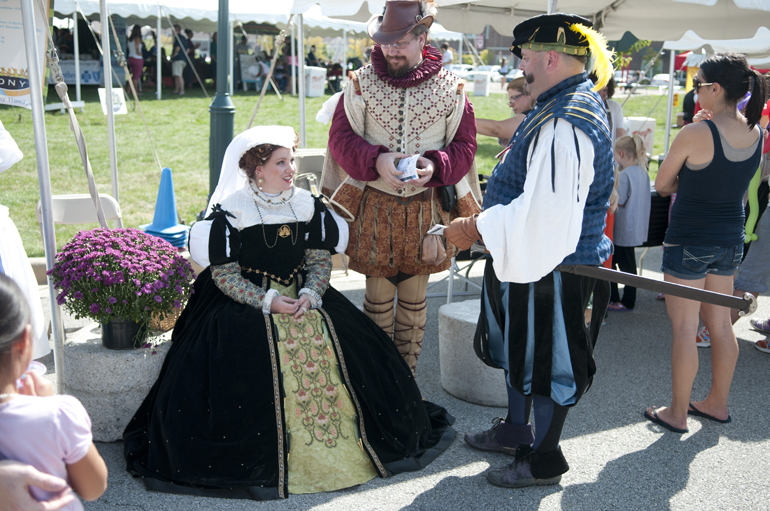 People dressed as Mary, Queen of Scots; the Duke of Norfolk; and mercenary Baron Hans von Lohnes converse during Fishers Oktoberfest at Saxony, Saturday, Sept. 28, 2013.