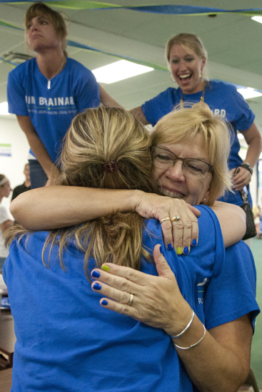 Melanie Lentz (front left), community relations and economic development specialist for Carmel mayor Jim Brainard, hugs her boss Nancy Heck after the Republican primary for the Carmel mayoral race between Brainard and City Council president Rick Sharp is called for Brainard, Tuesday, May 5, 2015.