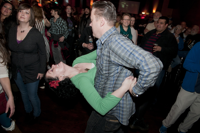 Tiffany Kloss and Mike Lightnin\' dance to Danny Thompson\'s covers of Elvis Presley during the 10th annual Elvis Birthday Bash at Radio Radio in Fountain Square, Saturday, Jan. 11, 2014.