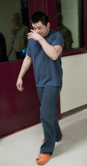 Misael Sanchez walks to his initial hearing on murder charges on Friday, April 5, 2013 at the Tippecanoe County Jail. Sanchez, charged with murdering his girlfriend at the Tree Long Apartments complex, was found in Arkansas.
