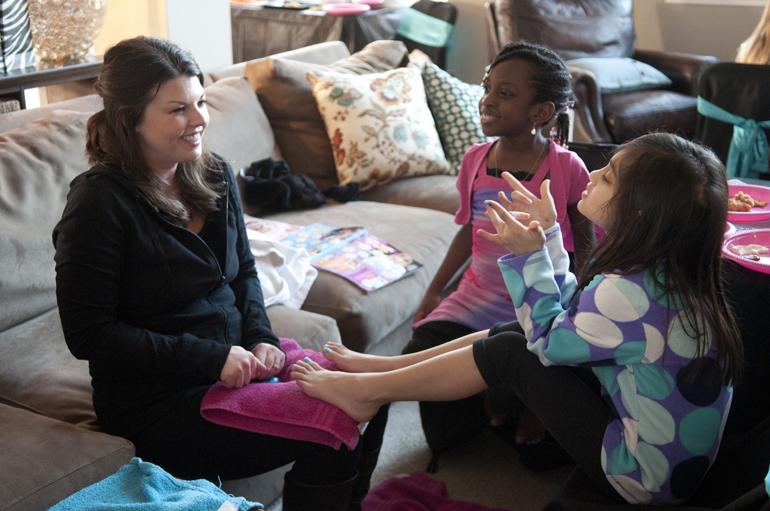 Pretty and Posh Parties co-ownder Jessica Johnson talks with Dami Adenike and Mila Shaw during their friend Kate Hollingsworth\'s birthday party and spa treatment provided by Pretty and Posh Parties at Hollingsworth\'s home in Fishers, Sunday, Feb. 15, 2015.