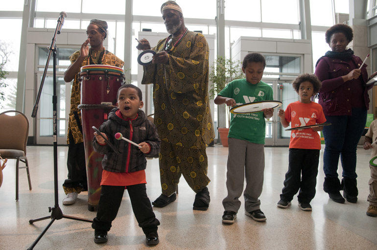 Children Tyrek Johnson, 3, Samuel Tandy, 8, and Arthur Rhea, Jr., 4, play drums with Mandela and Khabir Shareef during the annual Sankofa Black Heritage Festival at the Indiana State Museum, Saturday, Feb. 8, 2014. Sankofa, meaning \
