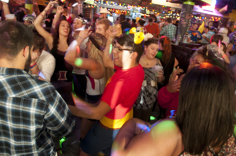 People dress in costume for a Halloween party at Tin Roof, Thursday, Oct. 31, 2013.
