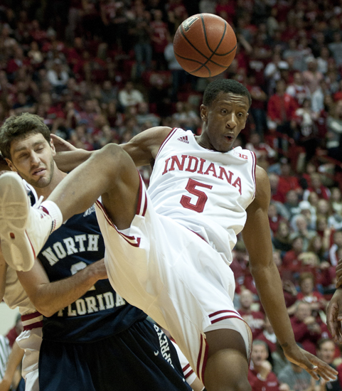 Hoosier forward Troy Williams falls after making a basket during IU\'s 89-68 victory against the University of North Florida at Assembly Hall in Bloomington, Saturday, Dec. 7, 2013.