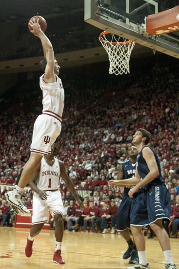 Hoosier forward Will Sheehey flies toward a dunk during the first half of IU\'s game against the University of North Florida at Assembly Hall in Bloomington, Saturday, Dec. 7, 2013.
