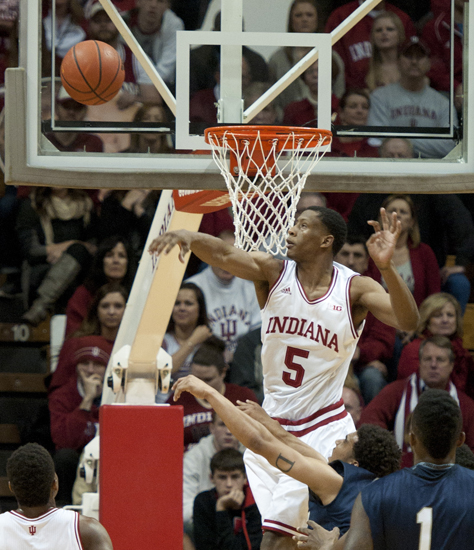 Hoosier forward Troy Williams blocks a shot during the first half of IU\'s game against the University of North Florida at Assembly Hall in Bloomington, Saturday, Dec. 7, 2013.