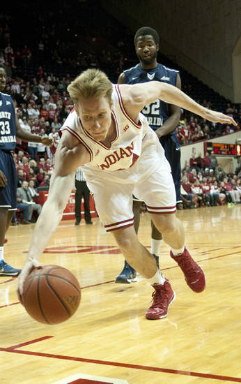 Hoosier forward Jeff Howard dives for a rebound during IU\'s 89-68 victory against the University of North Florida at Assembly Hall in Bloomington, Saturday, Dec. 7, 2013.