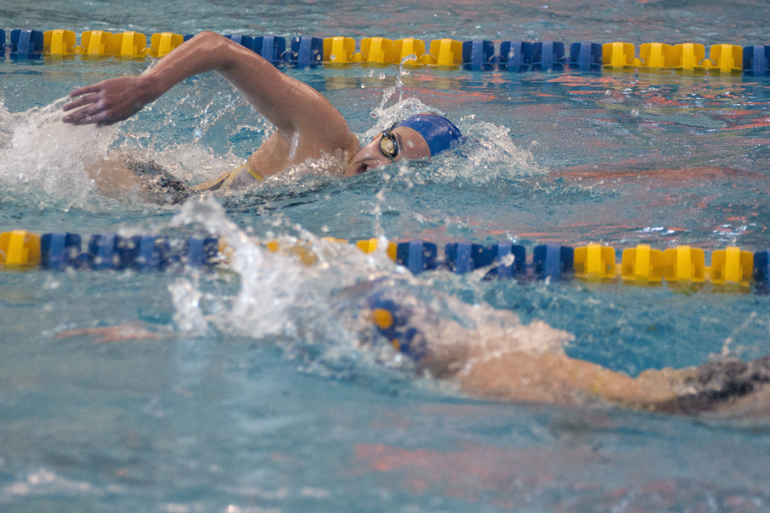 Emma Nordin maintains a one-lap lead over the competition in the 500 yard freestyle during the Metropolitan Interscholastic Conference swimming and diving championships at Carmel High School\'s Eric Clark Activities Center, Saturday, Jan. 10, 2015.