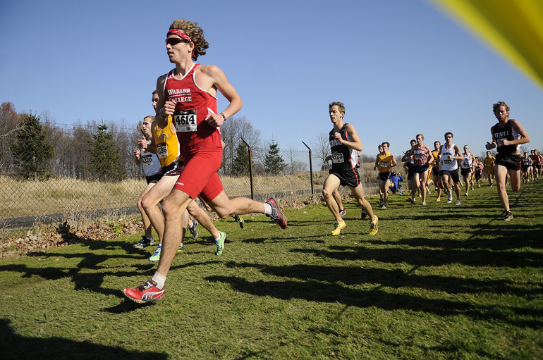 The guy in red is his teammate, Kevin McCarthy. He won the race.