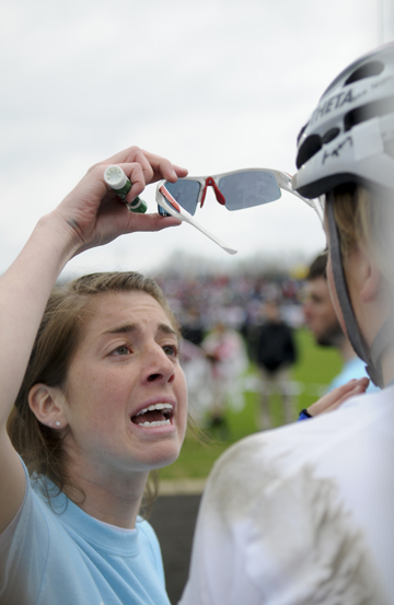 Kappa Alpha Theta coach Kristen Metherd takes the sunglasses off her sister, Rachel, to talk to her in the pit during the women’s Little 500. Metherd had just crashed in turn one.
