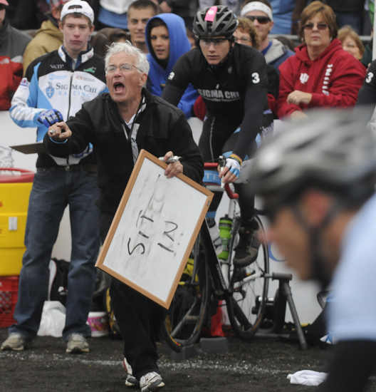 Sigma Chi coach Tom Schwoegler yells instructions to his riders with the help of a dry-erase board.