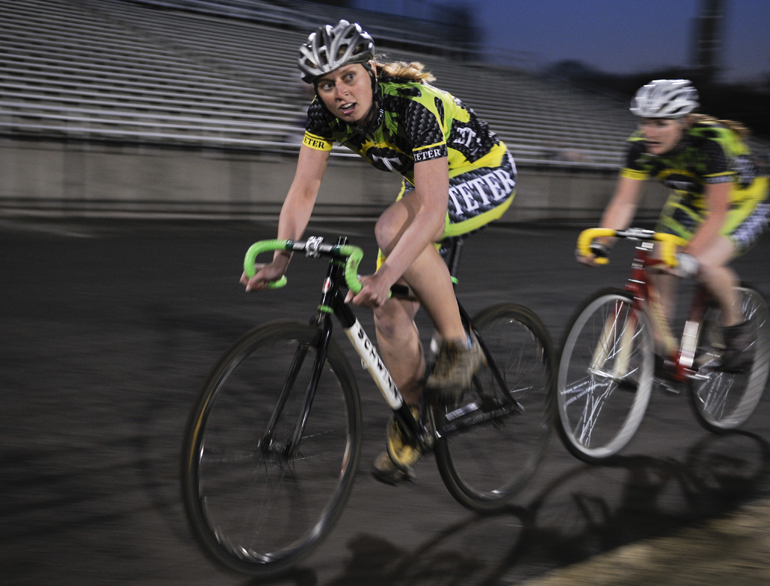 Senior Teter rider Caitlin Van Kooten looks across the track to the Delta Gamma team during the Little 500 Team Pursuit final on Saturday at Bill Armstrong Stadium. Teter won with a time of 8:00.1.