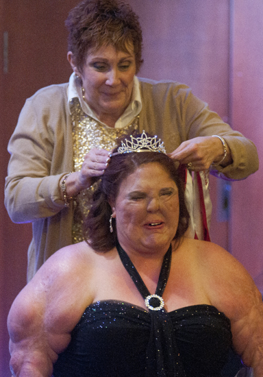 Ms. Wheelchair Indiana state coordinator Connie Murello-Todd crowns Ruth Smith as 2014 Ms. Wheelchair Indiana at the Basile Opera Center, Saturday, March 29, 2014. Contestant Jasmine Schlick was named the runner-up.