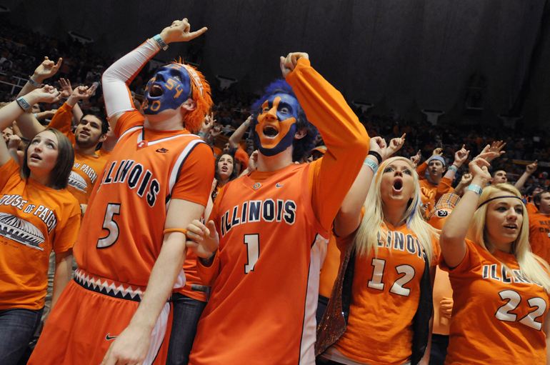Members of Illinois' Orange Krush cheer at the start of IU's 72-48 loss to the Fighting Illini on Saturday at Assembly Hall in Champaign, Ill.