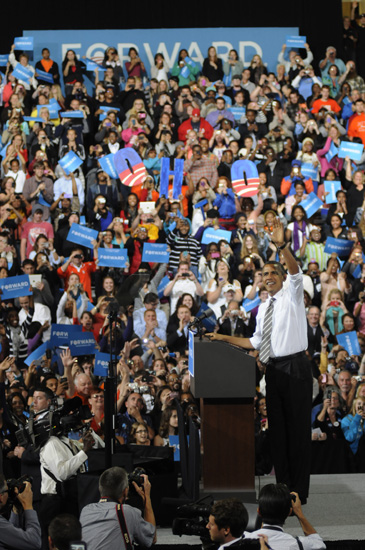 U.S. President Barack Obama waves to the crowd during a presidential campaign stop Sept. 26 at Bowling Green State University's Stroh Center in Bowling Green, Ohio.