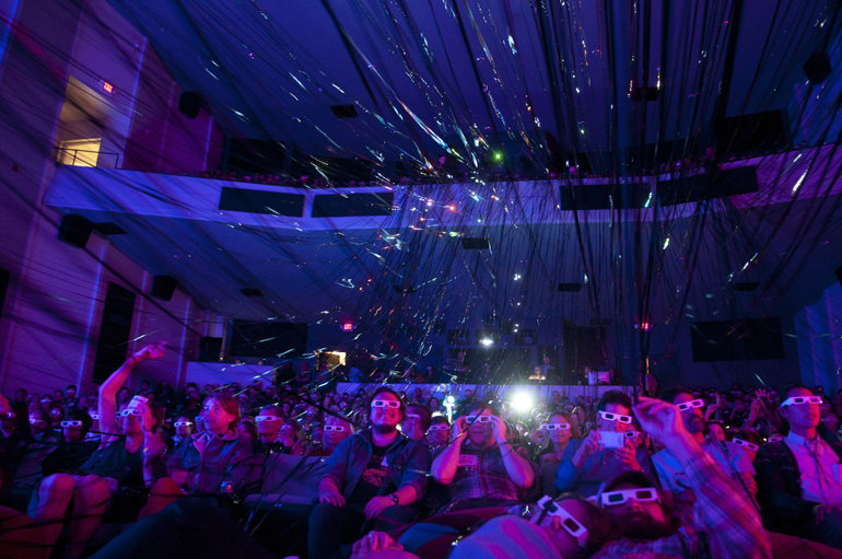 Black tape signifying a black hole drapes over the audience during Optical Popsicle, an annual variety show by the collective Know No Stranger, at The Toby Theatre at the Indianapolis Museum of Art, Saturday, Oct. 11, 2014.