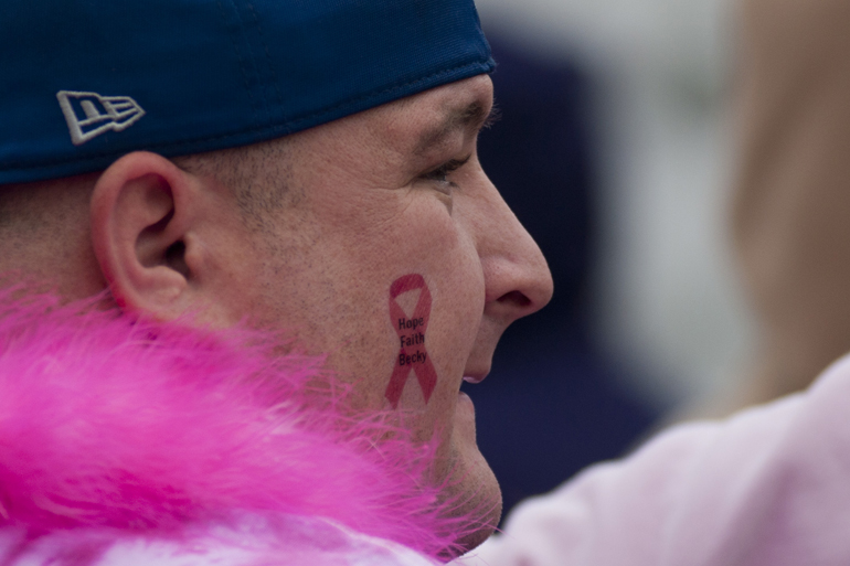 Jon Koers sports a tattoo for Becky Harp, who he said is having a double mastectomy on Monday, before the Making Strides Against Breast Cancer 5K walk downtown, Saturday, Oct. 26, 2013.