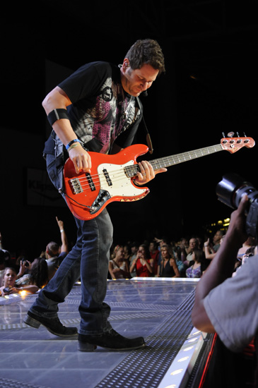 Rascal Flatts bass player Jay DeMarcus performs during the trio's performance on Friday, Aug. 31, at Klipsch Music Center in Noblesville.