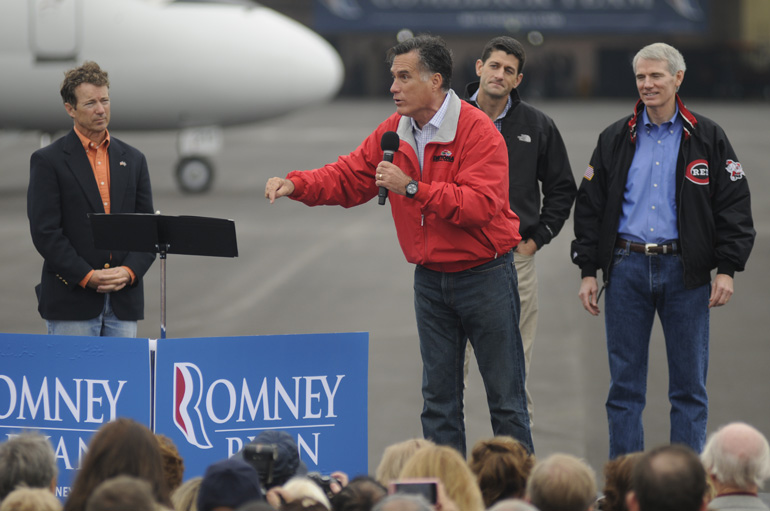 Former Mass. governor Mitt Romney speaks to a crowd of supporters during a Romney/Ryan presidential campaign stop Sept. 25 at Dayton International Airport Exposition Center in Ohio.