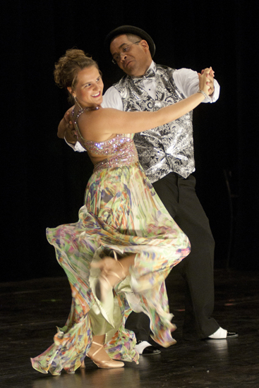 Arthur Murray Studio dancer Lindsay Koenings and Rafael Sanchez, WRTV-6 reporter, compete in the Dancing with the Johnson County Stars charity fundraiser at the Historic Artcraft Theatre in Franklin, Friday, Sept. 26, 2014. Sanchez danced for donations for Kic-It.