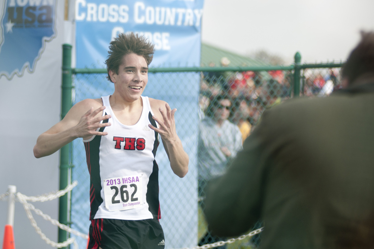 Jackson Bertoli of Terre Haute South reacts to winning the boys\' race of the 33rd IHSAA Cross Country State Finals in Terre Haute, Saturday, Nov. 2, 2013.