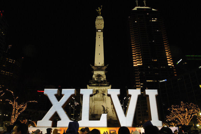 The Roman numerals for Super Bowl XLVI are lit in front of the Soldiers and Sailors Monument in Indianapolis.
