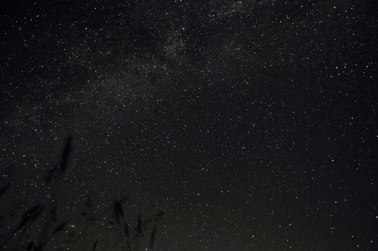 Milky Way Galaxy across the top, and its (our!) sister Andromeda Galaxy in the bottom left corner.
